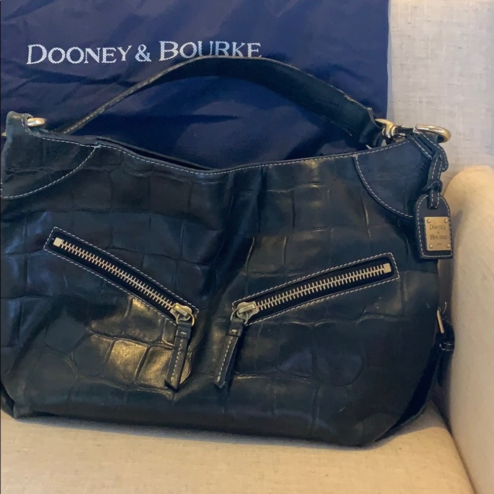 Well loved Dooney & Burke crocodile pattern purse.